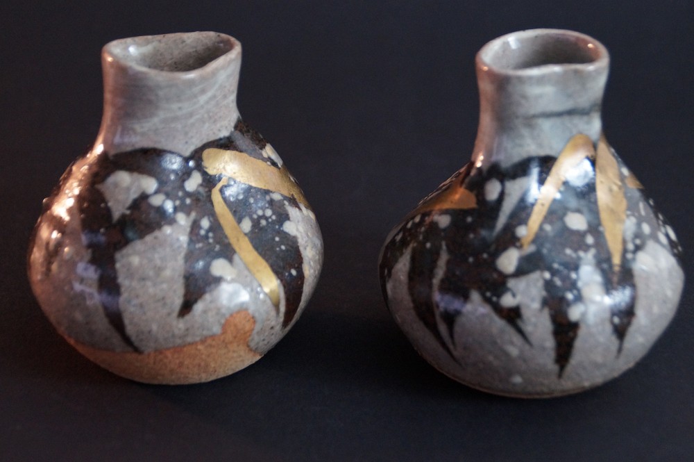 Side View of the Set with Iridescent Gray-Brown Glaze and Gold-Colored Decoration