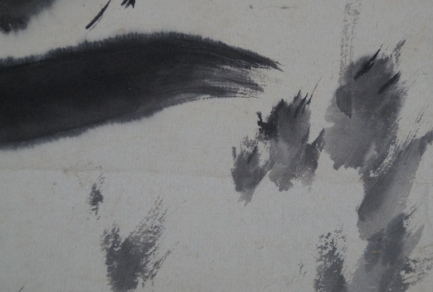 Close-up of the ink-dabbed tufts of grass in the makuri Black Cat and Dragonfly