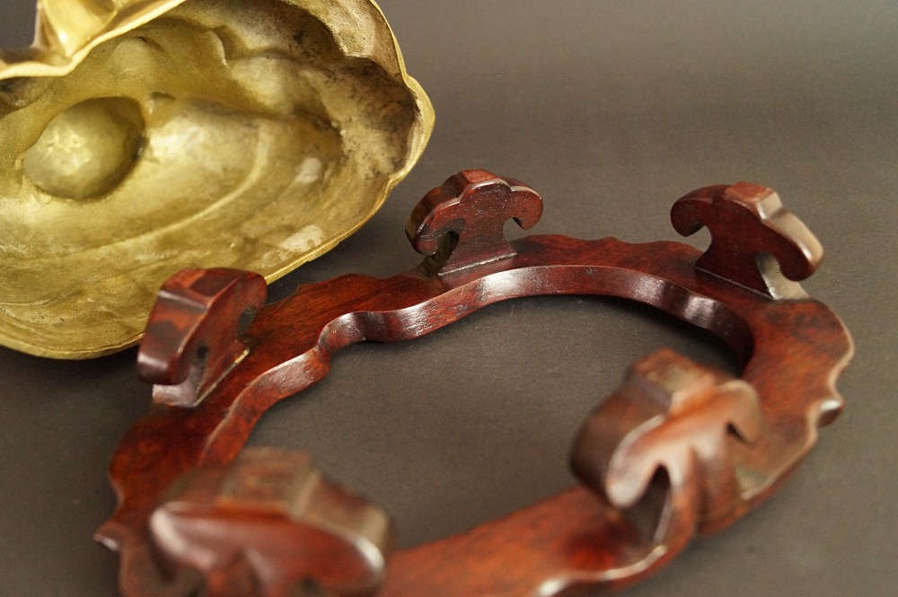 Hotei Figure Stand Close-Up