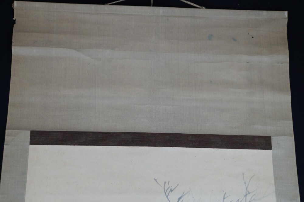 Detail view of the upper unpainted margin in the hanging scroll Raven on a Bare Branch by Watanabe Ando