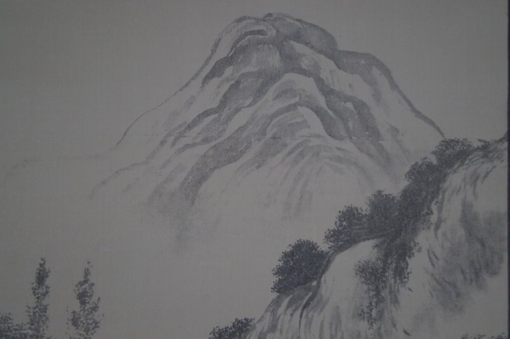 Landscape with water mill and waterfalls close-up of the distant mountain range in the mist landscape close-up