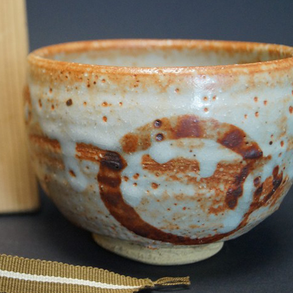 Tea bowl chawan made of Shino ware motif close-up preview