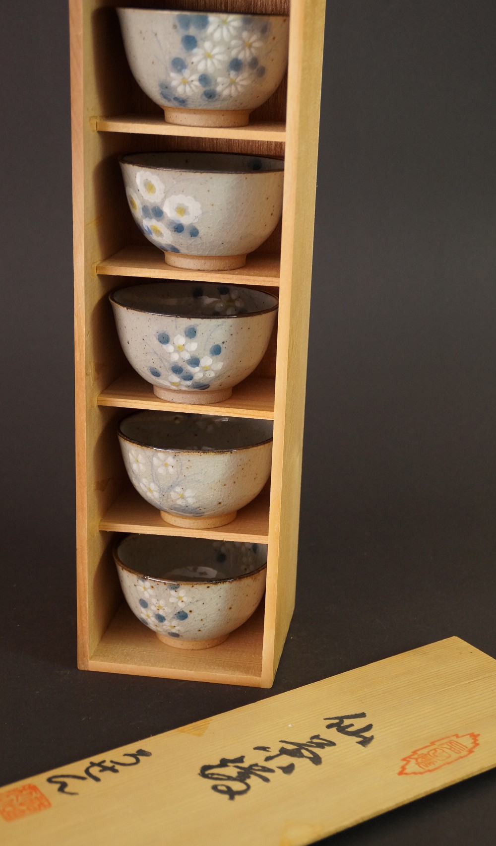 Set of five tea bowls made of Arita porcelain bowls in storage box