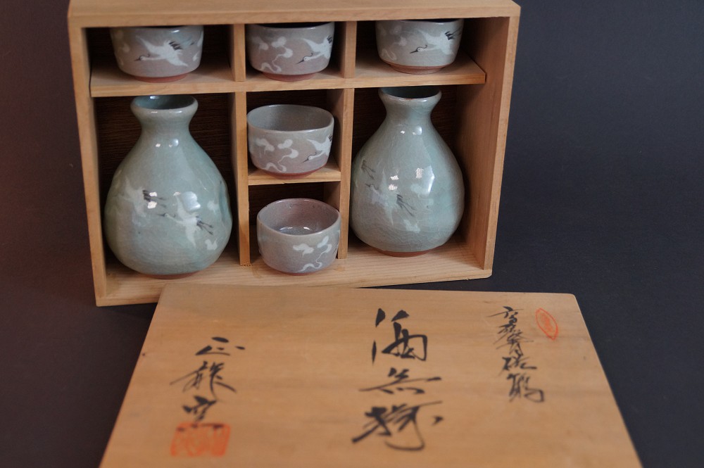 All seven pieces of the set nestled in the divided compartments of the storage box