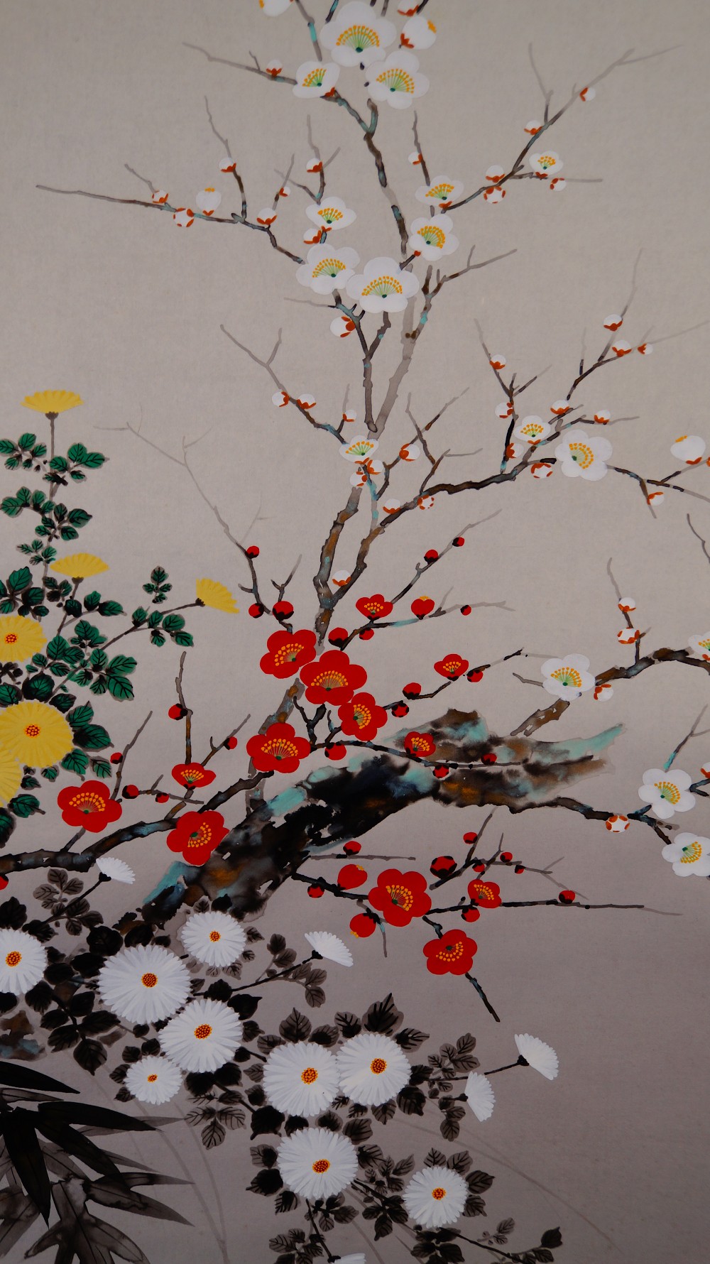 Further close-up of the red and white plum blossoms next to the yellow chrysanthemums in the kakemono The Four Noble Plants by Endo Keizo
