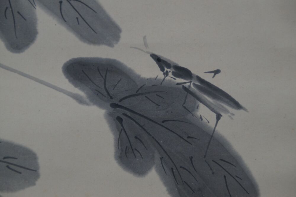 Close-up of the grasshopper on a leaf in the hanging scroll Hibiscus Flowers and Grasshopper