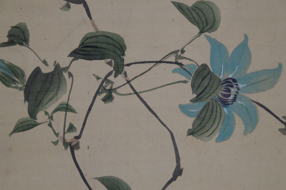 Close-up of the blue clematis blossom in the hanging scroll Autumn Riverside Vegetation with Butterfly