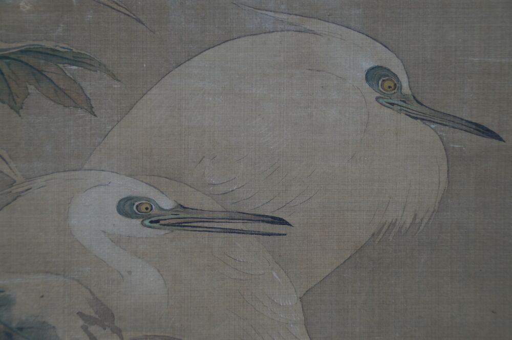 Close-up of the heads of the two herons in the Kakemono Herons in Quiet Peony Splendor