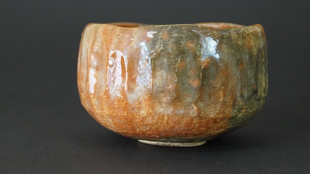 Further view of the chawan tea bowl made of Raku ware with ribbed wall