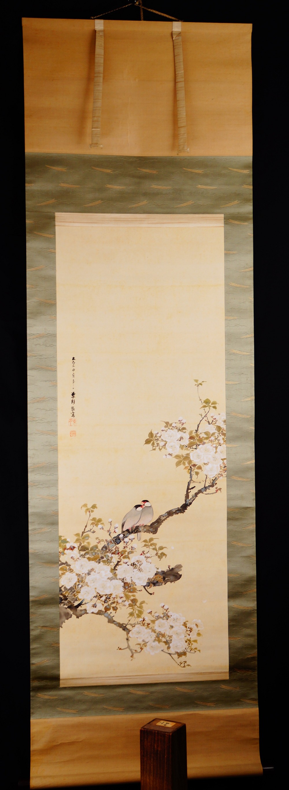 Spring Awakening two birds on a blossoming cherry branch as kakemono in full view with green border mounting