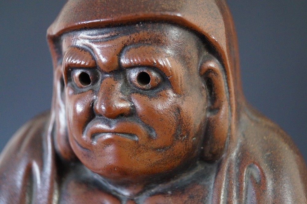 Daruma Figure Made of Bizen Ware Face Close-Up