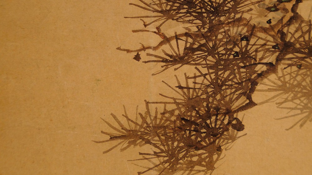 Close-up of the ink-painted pine needles and branches of the hanging scroll by Murata Toho