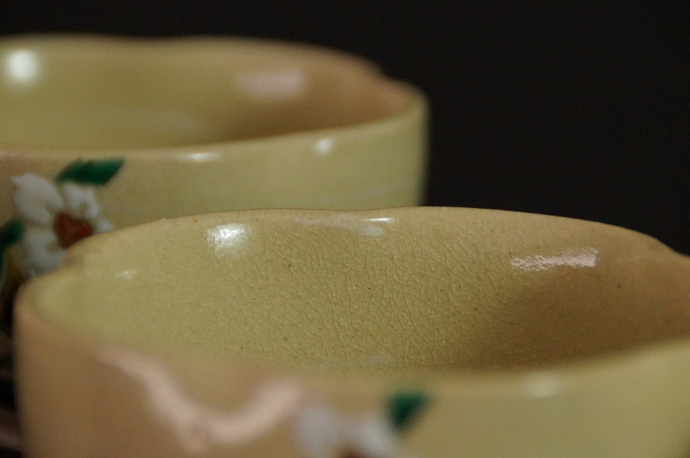 Set of five tea bowls made of Kutani porcelain glaze close-up