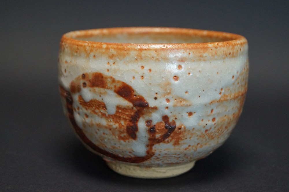 Tea bowl chawan made of Shino ware front view