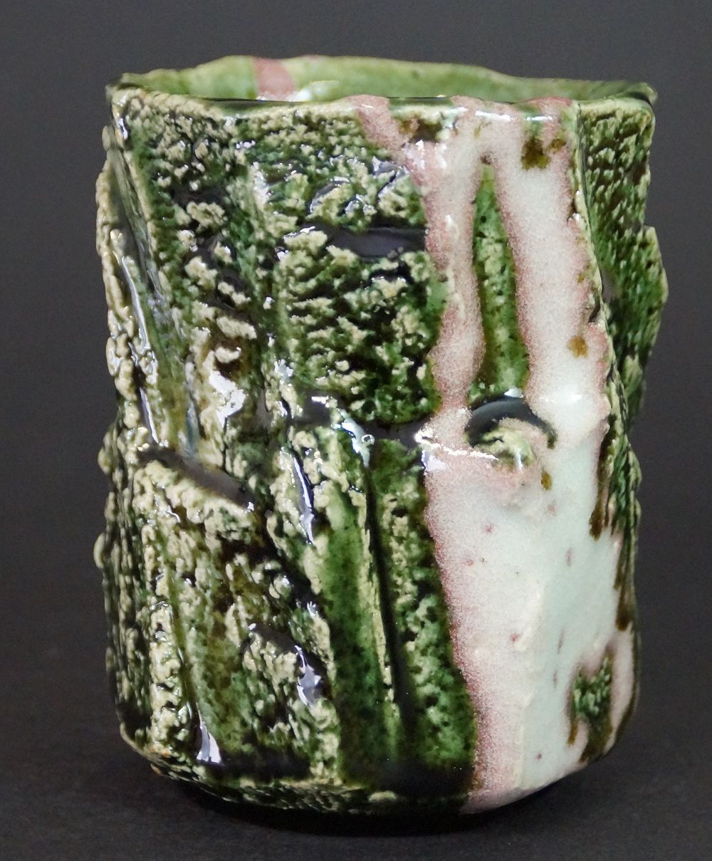 Further view of the yunomi tea bowl made of Oribe ware with a textured green glaze