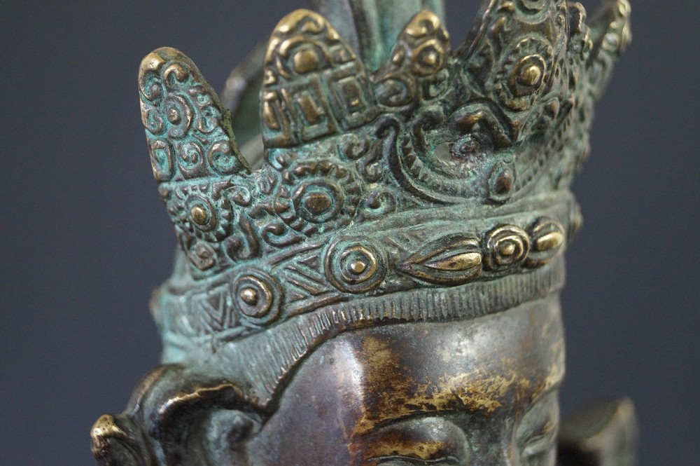 Chinese Buddha figure made of bronze motif close-up 3