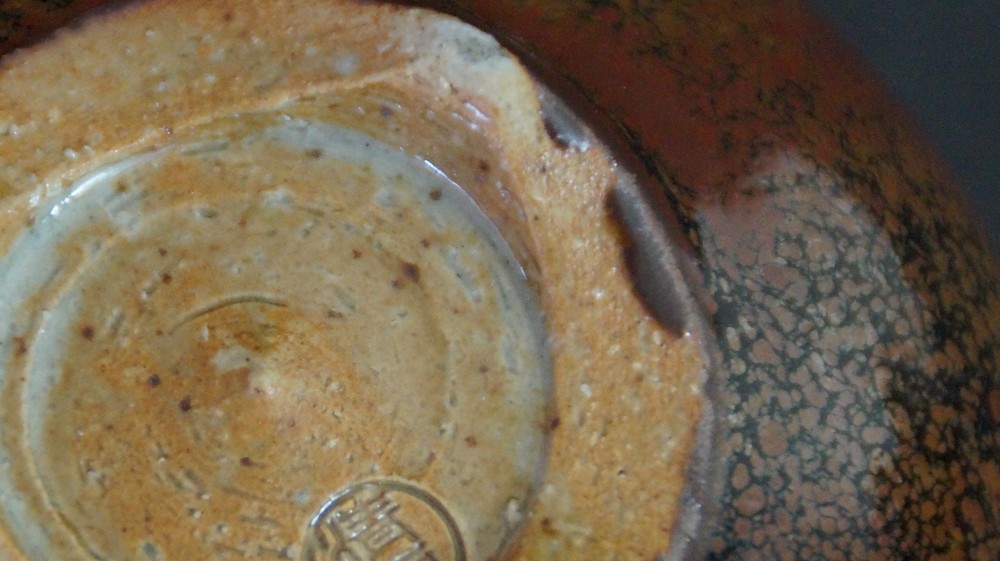 Close-Up of the Glaze Structure at the Rim with Light Blue Crystallization in the Tenmoku Firing