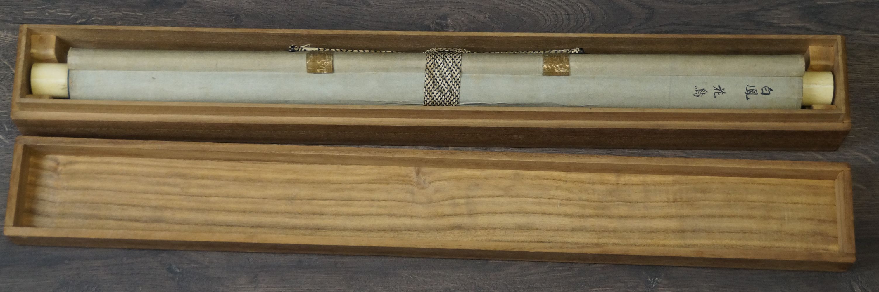 Rolled-up hanging scroll Bird on Fruit Tree in the opened storage box