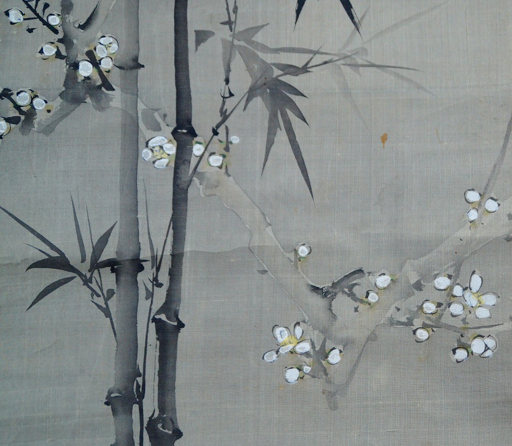 Close-Up of the White Plum Blossoms with Bamboo Leaves