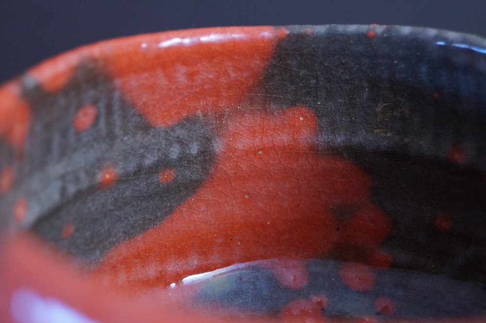 Raku tea bowl chawan by Shoraku Sasaki glaze close-up