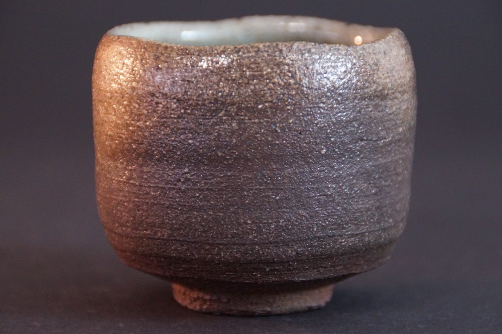 Another side view with warm brown and gray tones