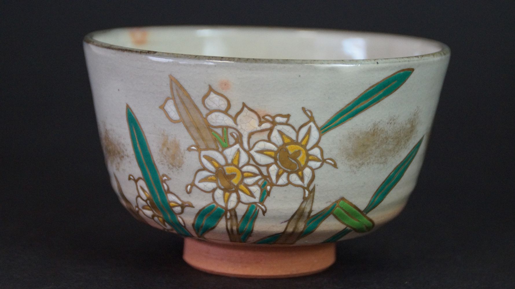 Further view of the chawan tea bowl made of Kyoto ware with green bamboo leaves