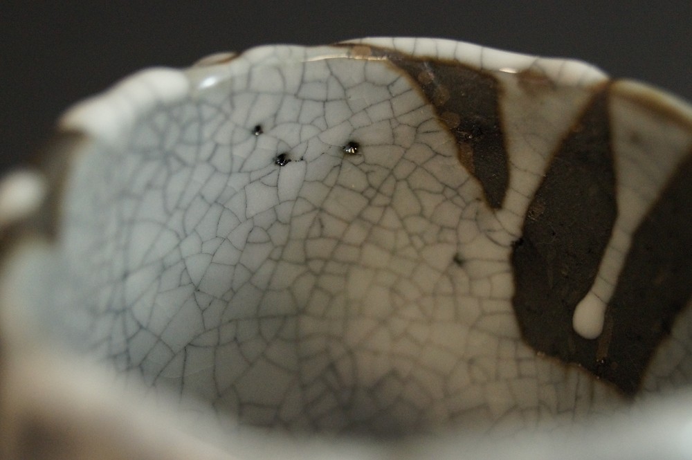 Close-up of the crackled glaze inside the sake cup Interior View Close-Up