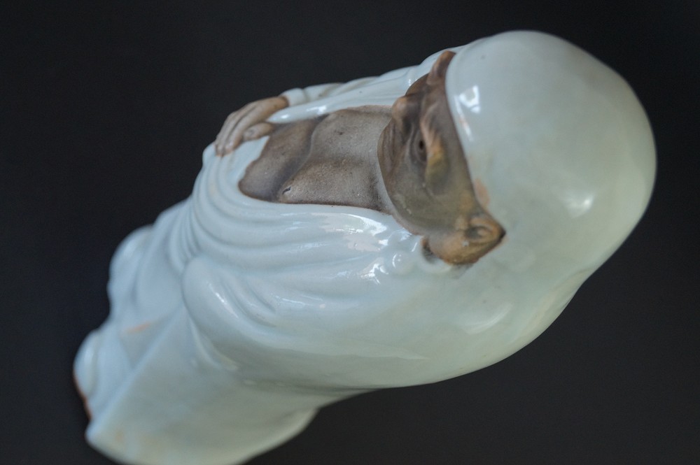 Japanese Bodhidharma Daruma figure made of Kutani porcelain view from above