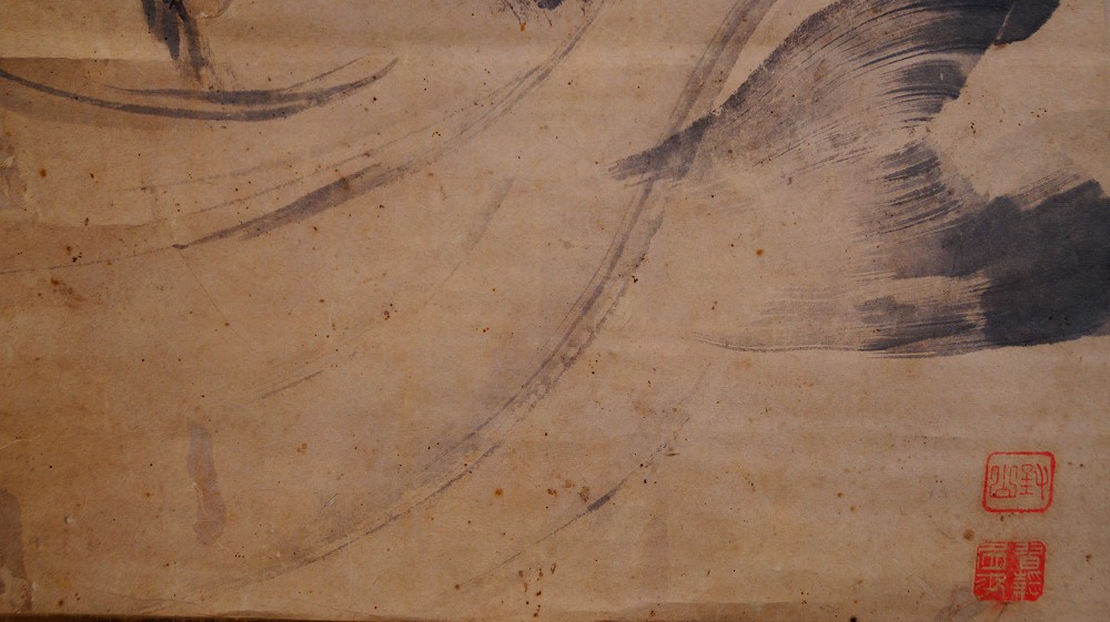 Further close-up of the ink brushwork on the tail fin and water waves