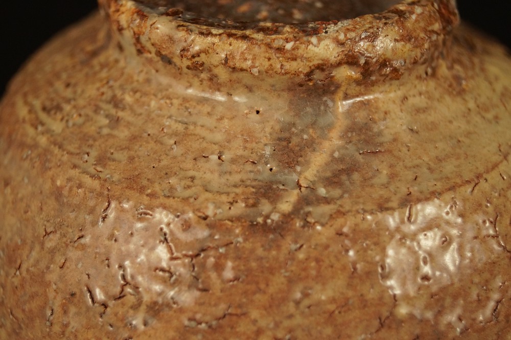 Earthy glaze texture on the neck glaze close-up