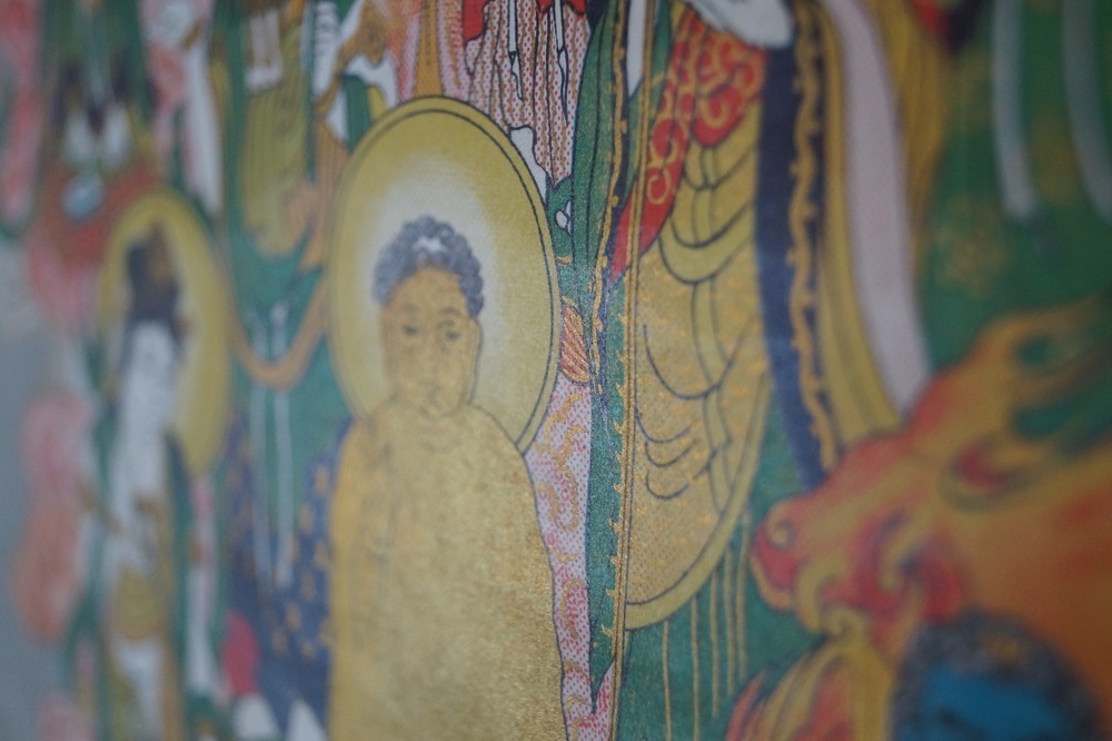 The 13 Buddhas Soft Close-Up of a Golden Buddha Figure Motif Close-Up 3