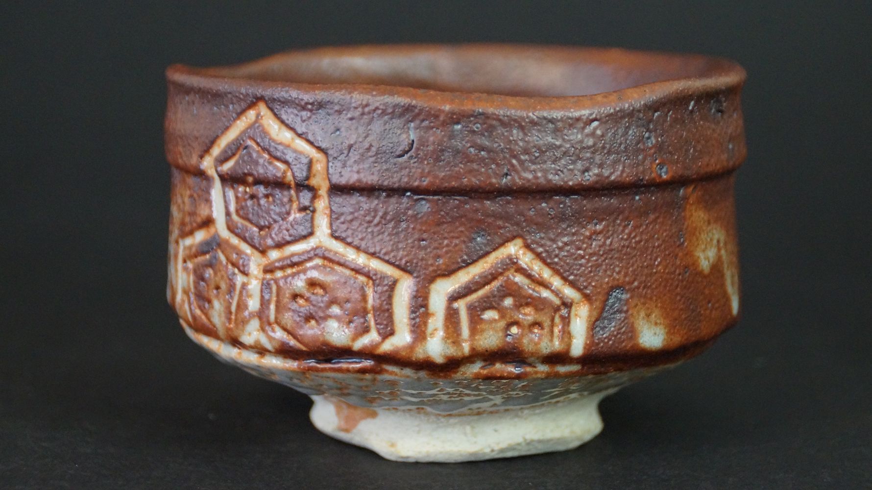 Further view of the Chawan tea bowl made of Shino ware with greenish glaze streaks
