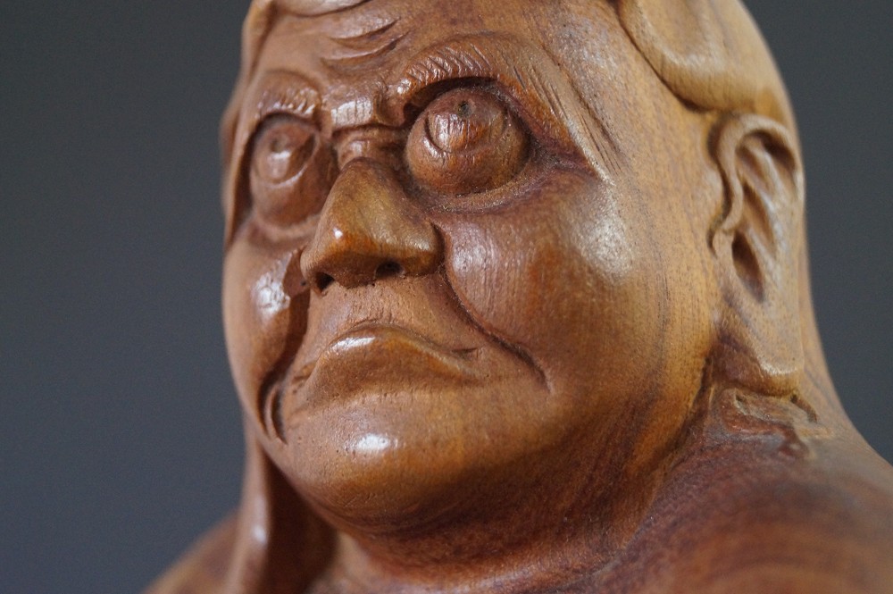 Bodhidharma wooden figure face close-up 1