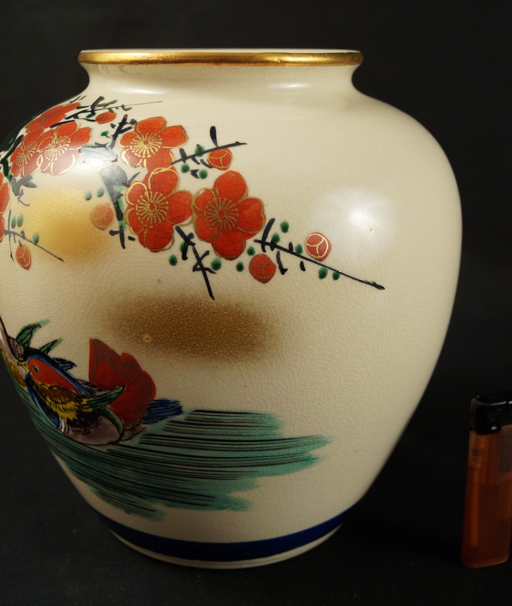 Duck and plum blossom vase size comparison