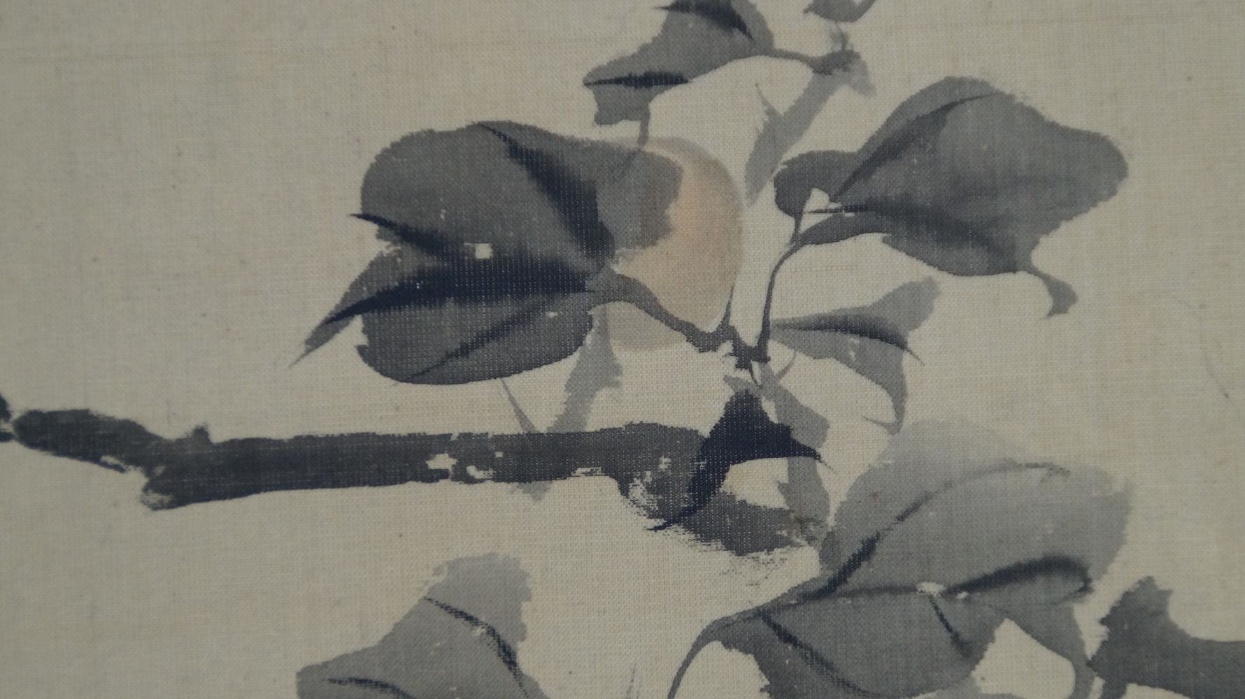 Close-up of the persimmons and leaves of the fruit tree in the hanging scroll Sparrows on a Fruit Tree