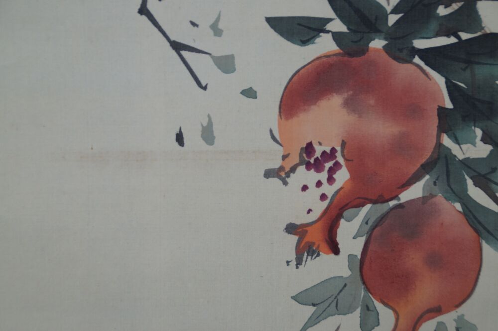 Further close-up of two pomegranate fruits with visible seeds in the hanging scroll Pomegranate Branch and Starling