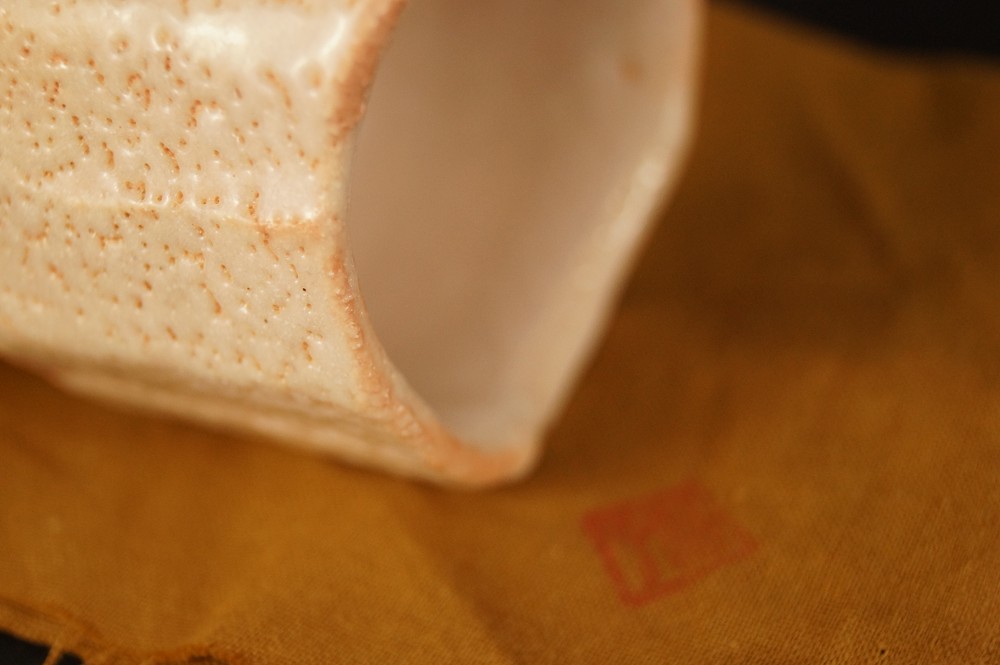Glaze Rim Resting on Yellow Cloth Glaze Close-Up 2