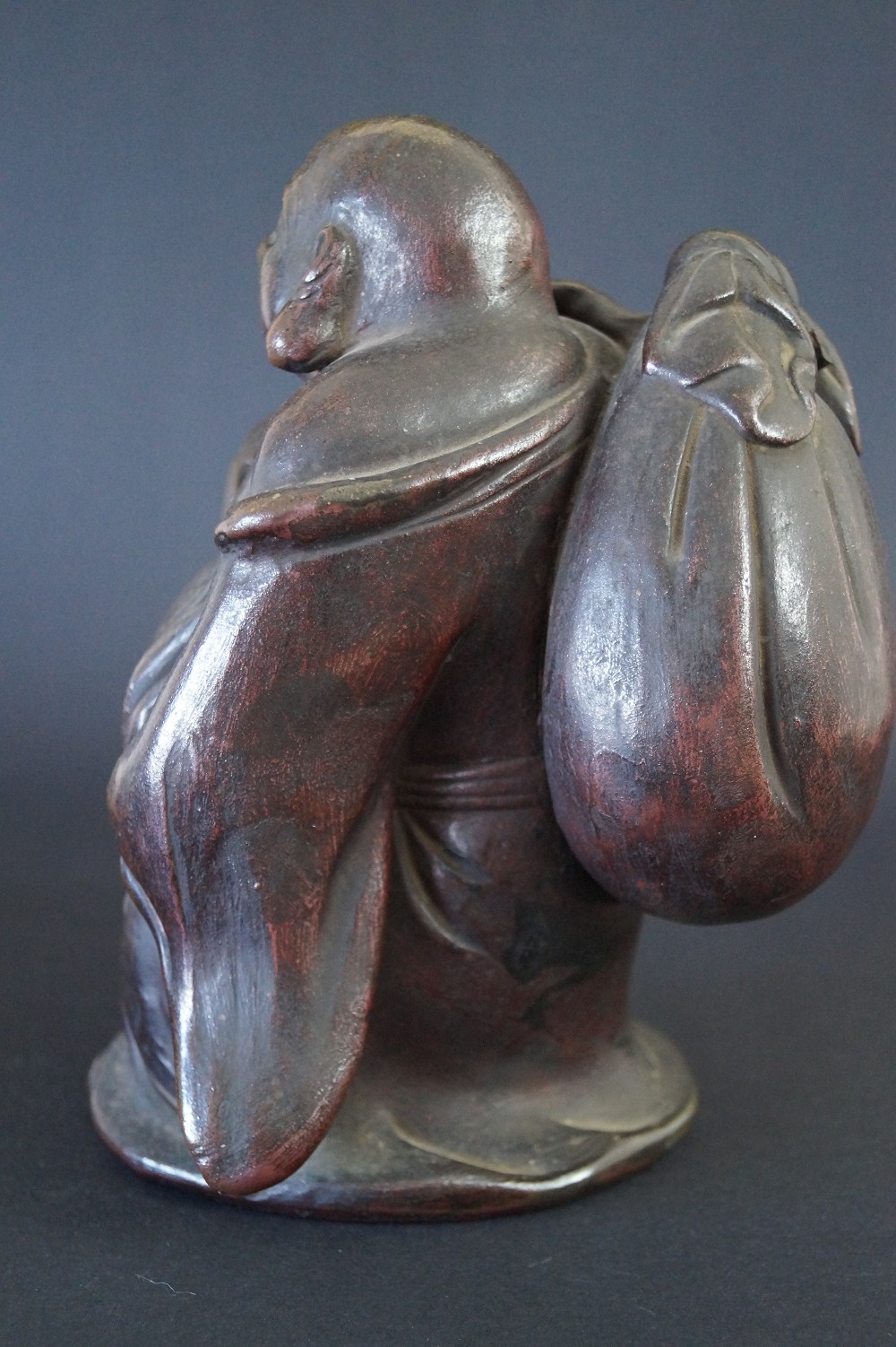 Hotei figure made of Bizen ware rear view