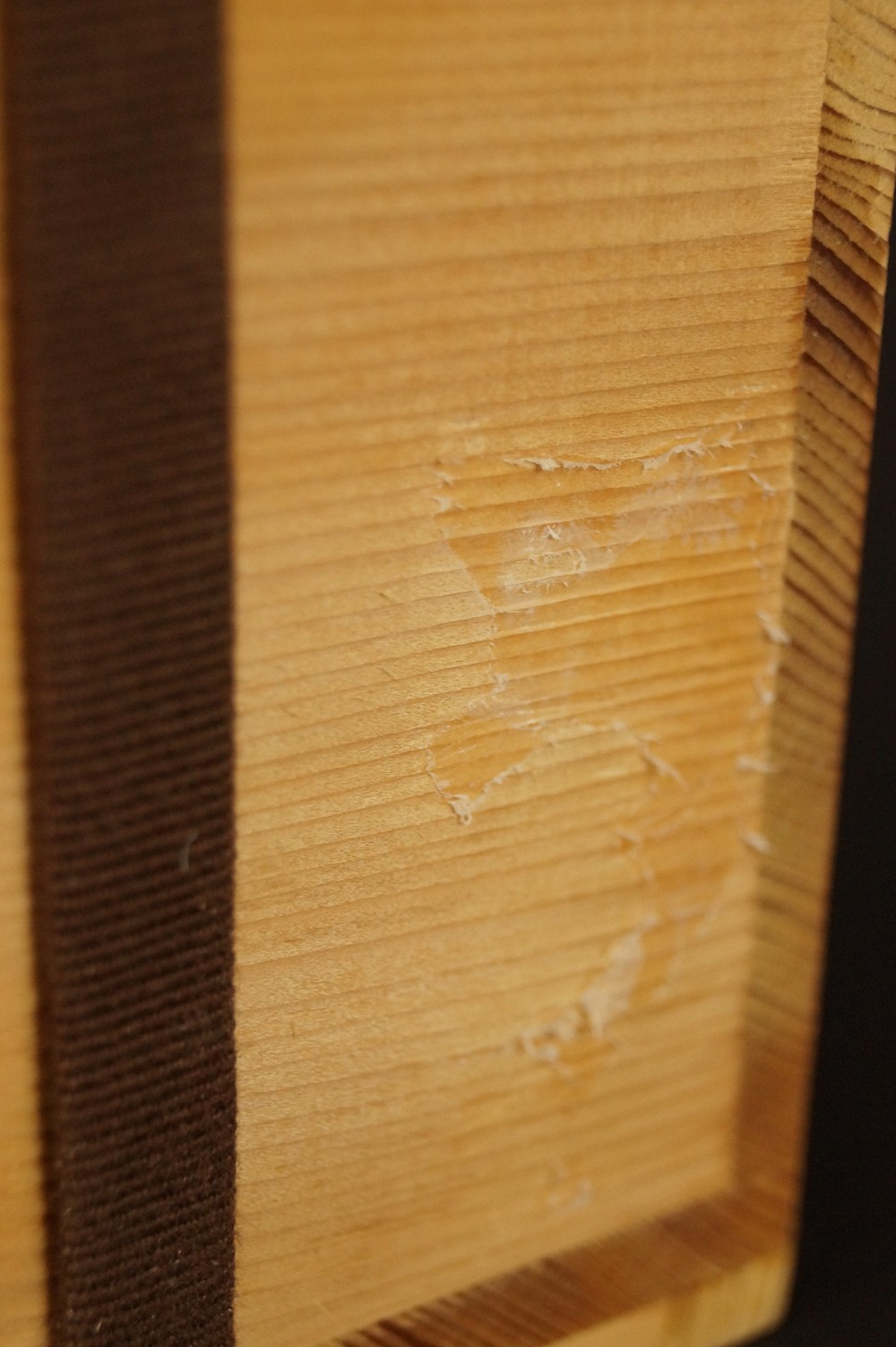 Wood Grain of the Storage Box with Traces of Signature Storage Box Close-Up