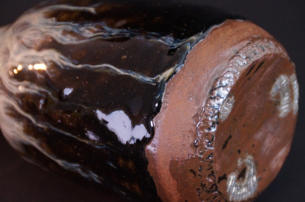 Close-up of the unglazed foot with visible fire marks