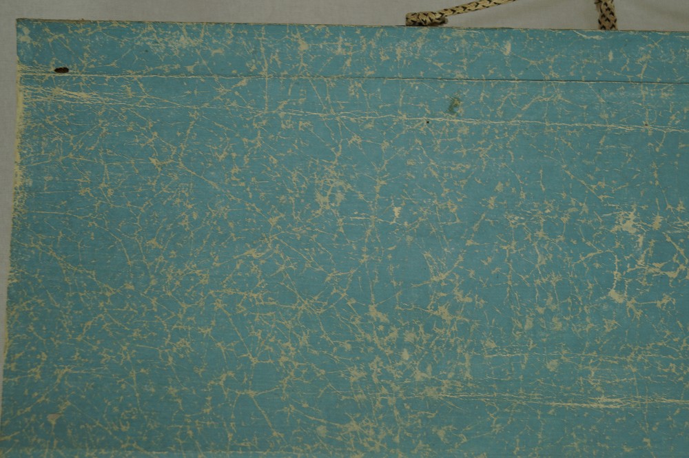 Calligraphy print Establish Justice close-up of the fabric mounting at the top edge mounting detail 2