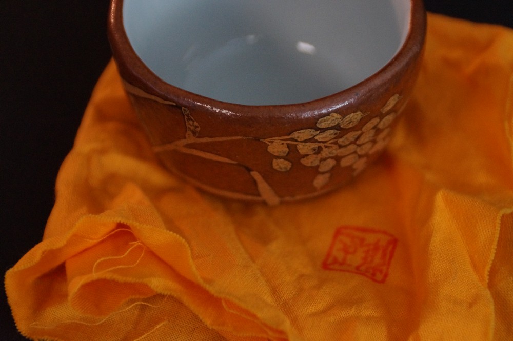 Close-Up of the Foot with Stamped Potter's Mark and Gold-Colored Branch Motif
