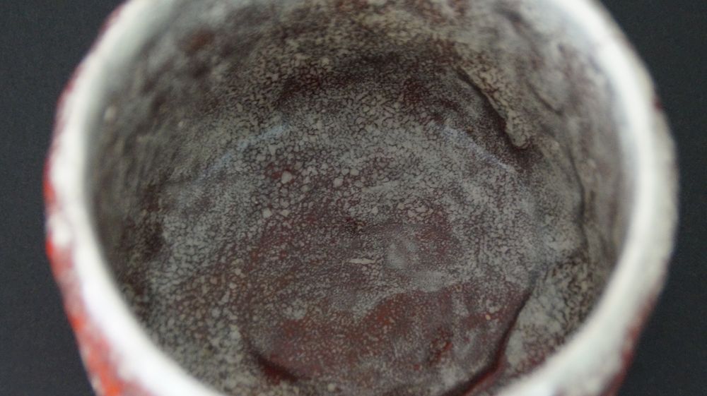 Close-up of the dark speckled interior glaze of the chawan tea bowl made of Minoh ware