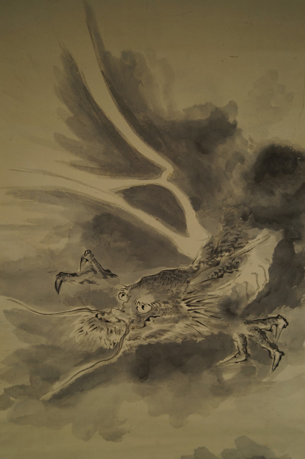 Dragon head with outspread wings motif close-up
