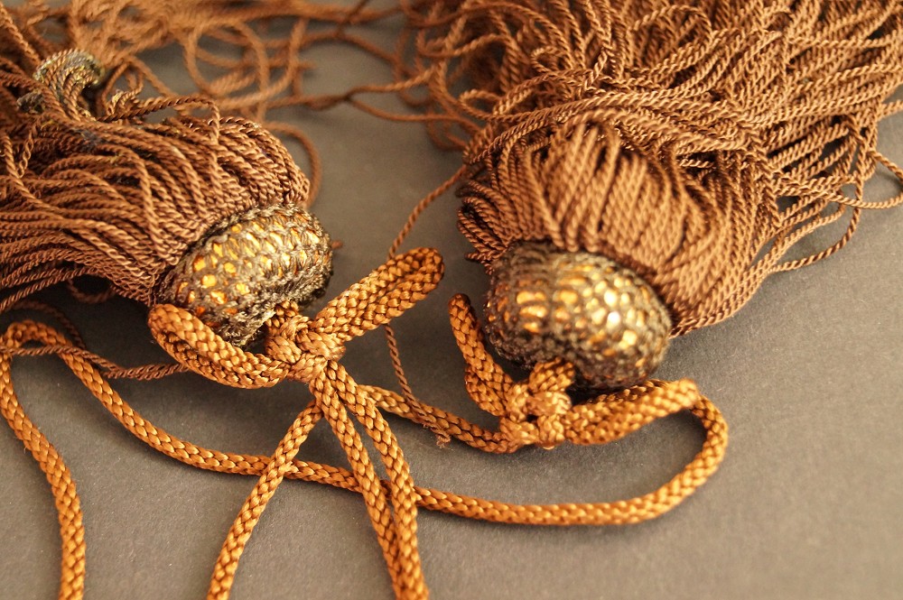 Two gold-colored bead caps of the silk tassels with cords Tassel Close-Up 3