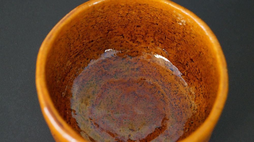 Close-up of the interior glaze with spiral structure of the chawan tea bowl made of Ohi ware