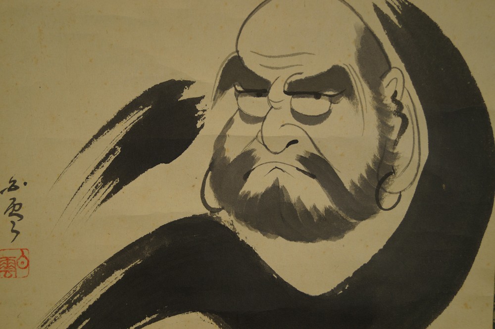 Bodhidharma portrait with ink circle motif close-up