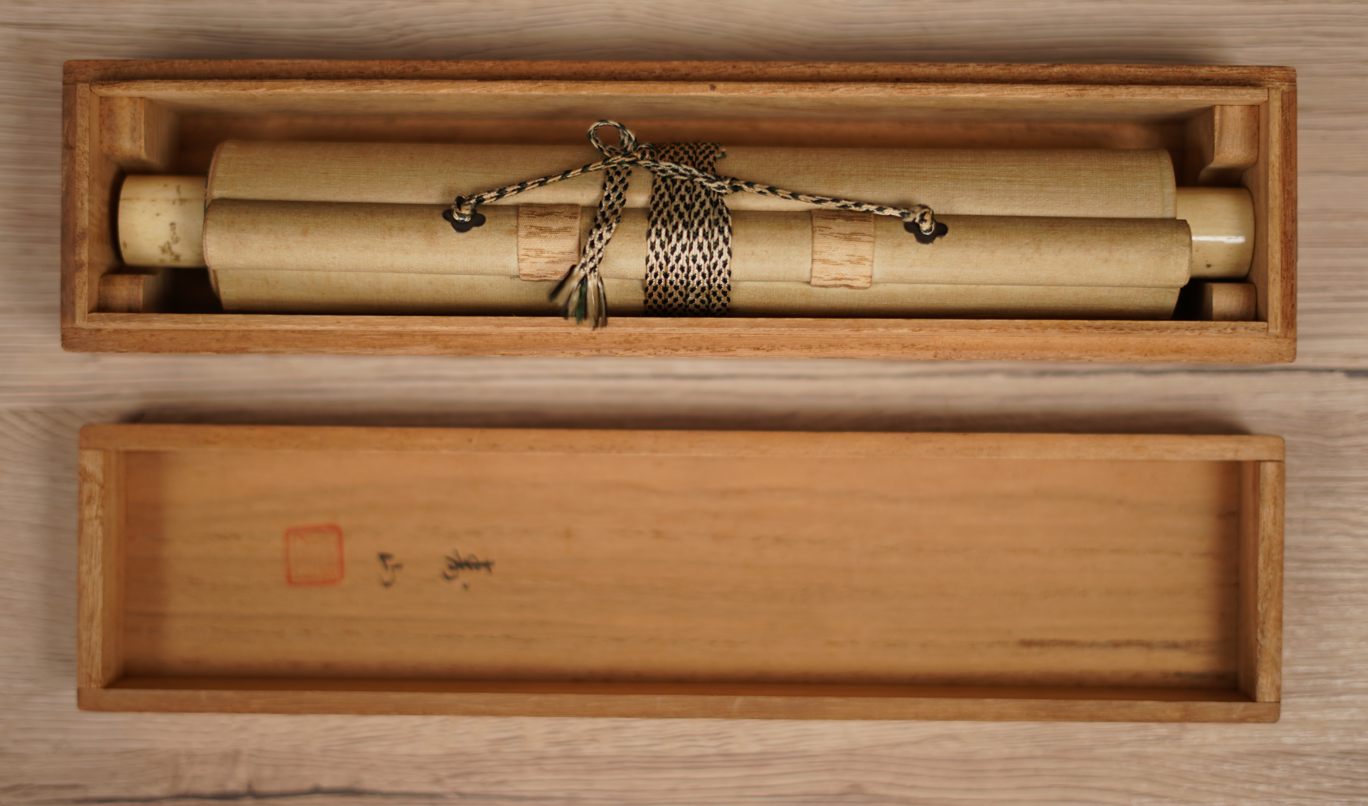 Opened Storage Box with Rolled-Up Hanging Scroll Hanging Cherry Blossoms