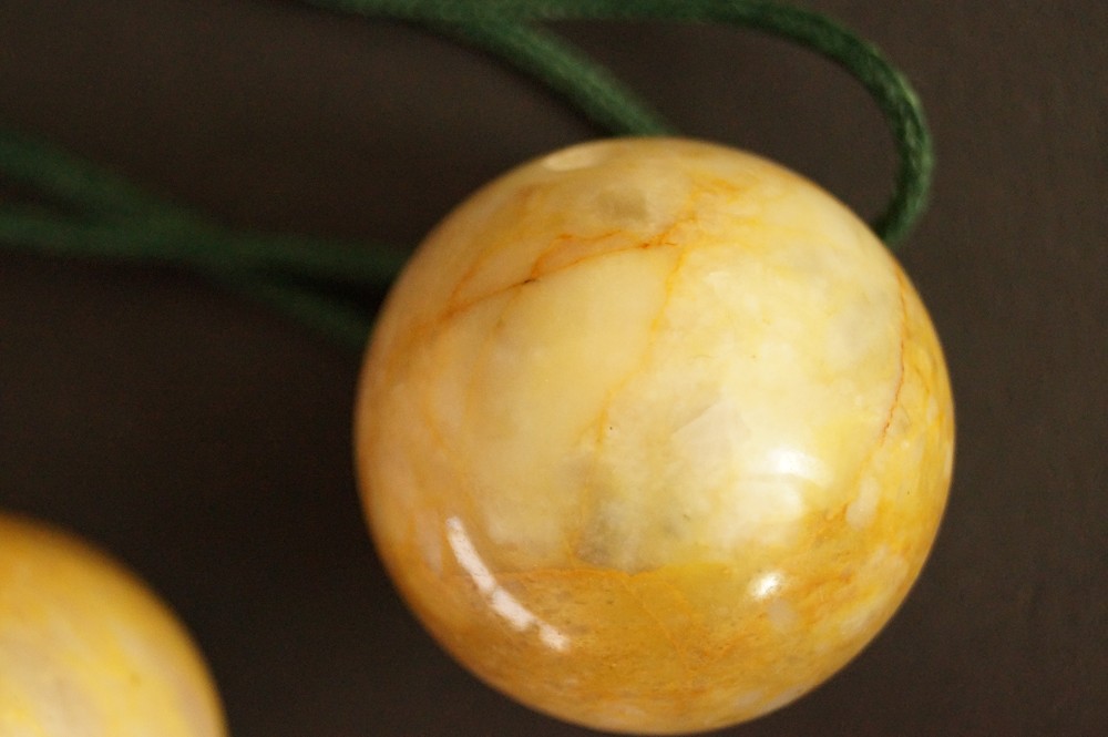 Natural stone ball with fine red veining stone close-up 5