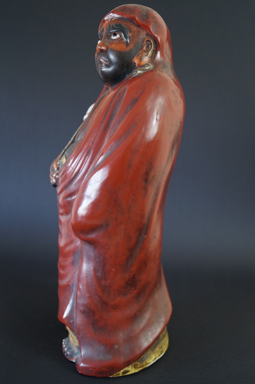 Daruma figure made of Kutani porcelain side view